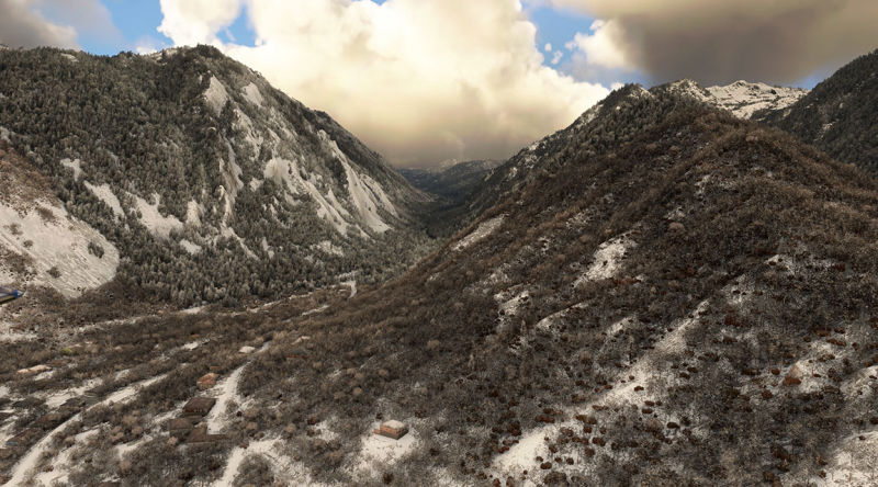 Scenic view of snow-capped mountains in winter.
