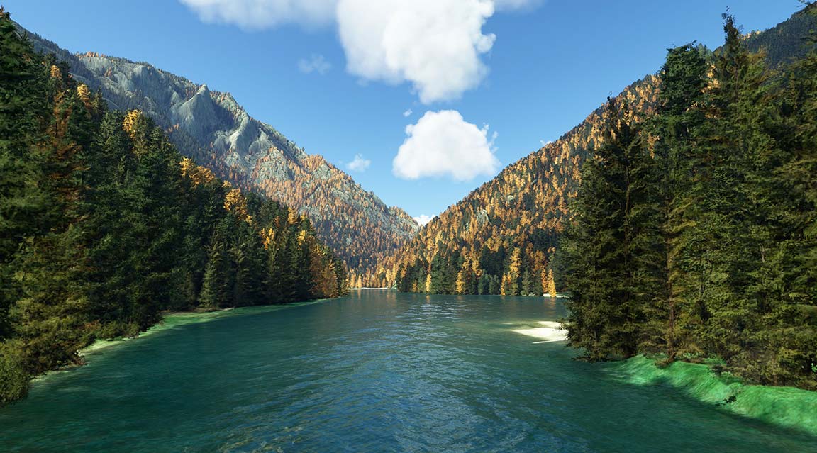 Scenic river flowing through mountain landscape with lush trees and grass.