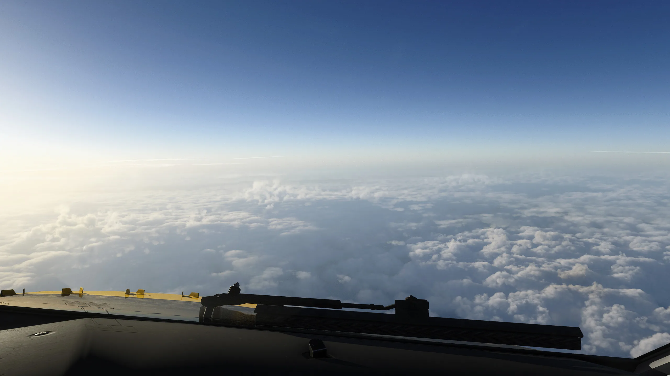 View over the wing above a sea of clouds with a clear blue sky gradient, rendered with REX Atmos CORE