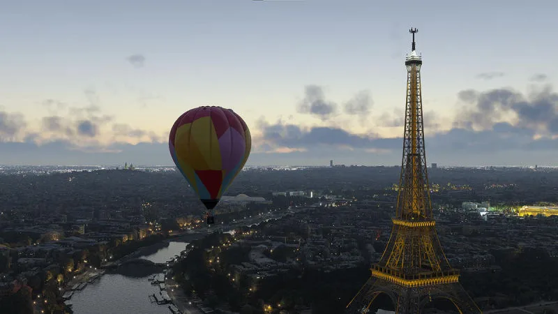 Hot air balloon drifting past the Eiffel Tower over Paris at dusk, REX Atmos CORE atmospheric lighting in Microsoft Flight Simulator 2024
