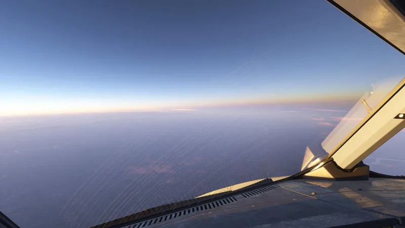 Airliner cockpit view of a hazy horizon at high altitude, REX Atmos CORE atmospheric depth in Microsoft Flight Simulator 2024