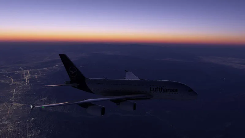 Lufthansa Airbus A380 cruising at twilight above glowing city lights, REX Atmos CORE sky colors in Microsoft Flight Simulator 2024