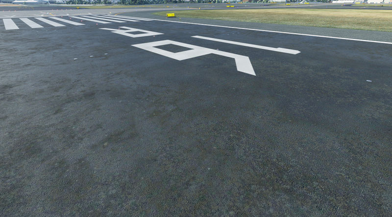 A plane on a tarmac, getting ready for flight.