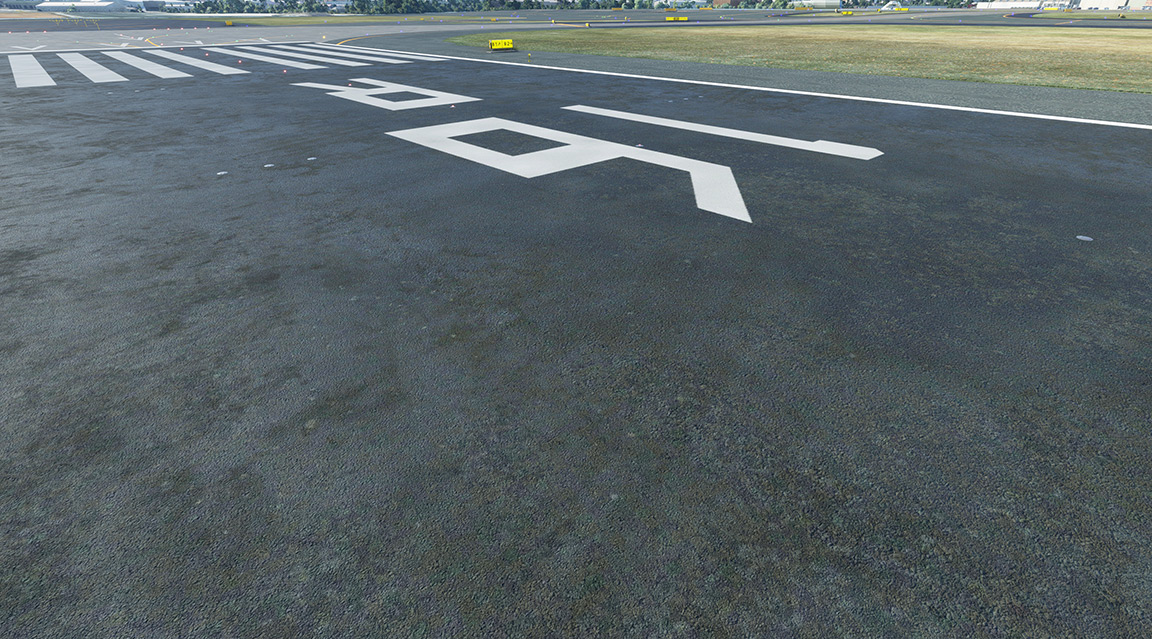 A plane on a tarmac, getting ready for flight.