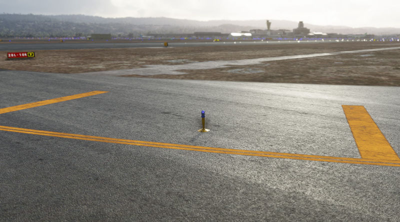 Yellow line marking at an airport.
