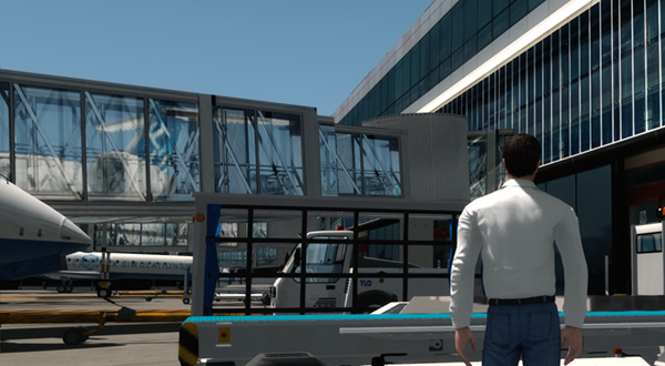 A man standing in front of a large airplane at an airport terminal with jetway.