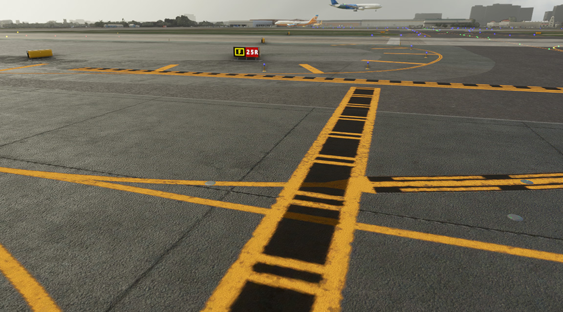 A jetliner parked on the runway at an airport.