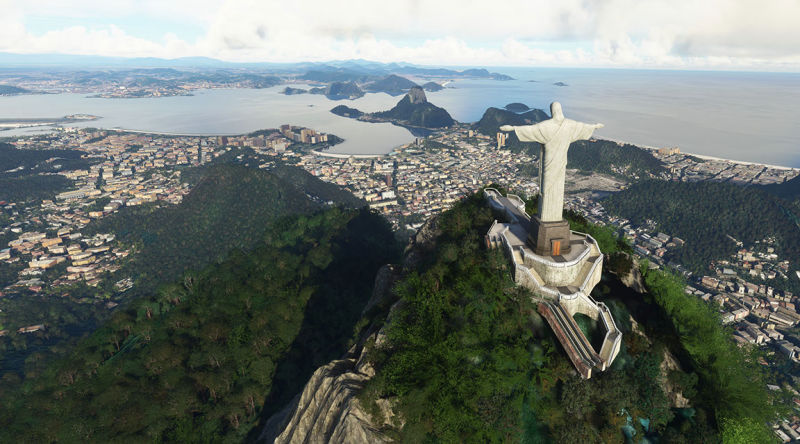 Statue of Christ overlooking Rio de Janeiro from atop a mountain.