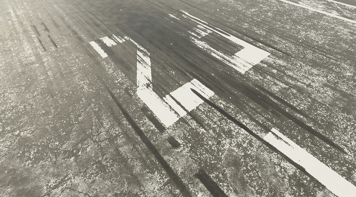 Runway 8 at an airport in winter.