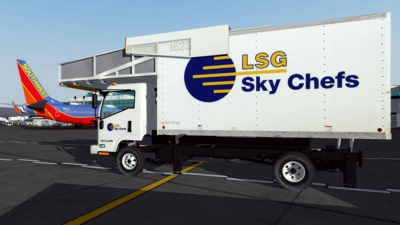 A truck parked on airport tarmac during operations.