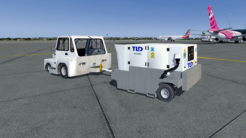 Image of a small power vehicle parked on the tarmac.