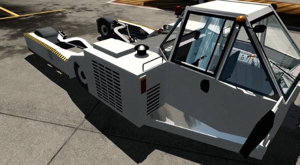 White truck designed for airport pushback operations.