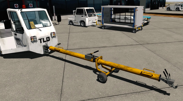 Airport pushback vehicle with tow bar, featuring 'TLD' branding.