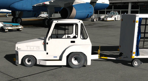 Image of a white truck with a trailer, used as an airport tug vehicle.