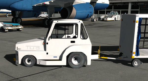 Image of a white truck with a trailer, used as an airport tug vehicle.